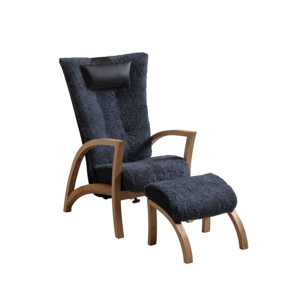 Bröderna Anderssons Focus-nojatuoli ja rahi, kiinteä jalka. Tummanharmaa lampaantalja.